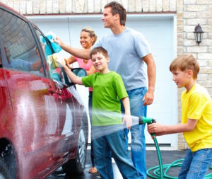 Family Washing Car